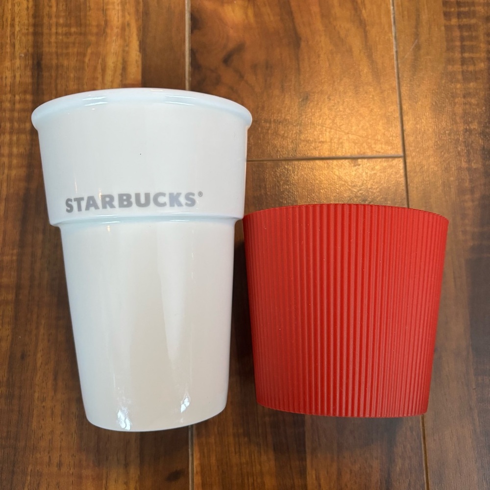 Starbucks 2011 8oz white travel mug with removable red silicone sleeve